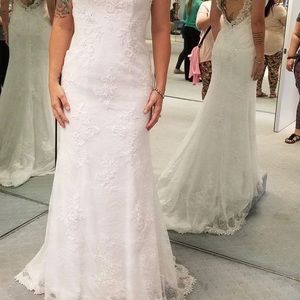 Brand new wedding dress. Never worn. Only tried on